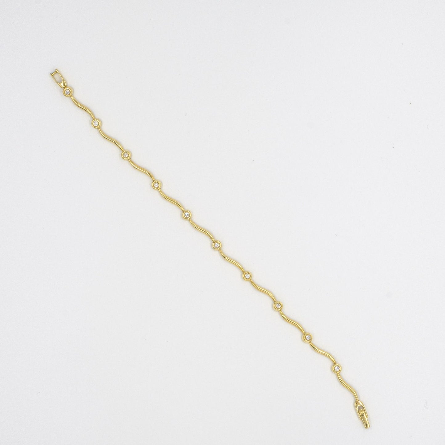 Diamond Set Wave Design 18ct yellow gold Bracelet