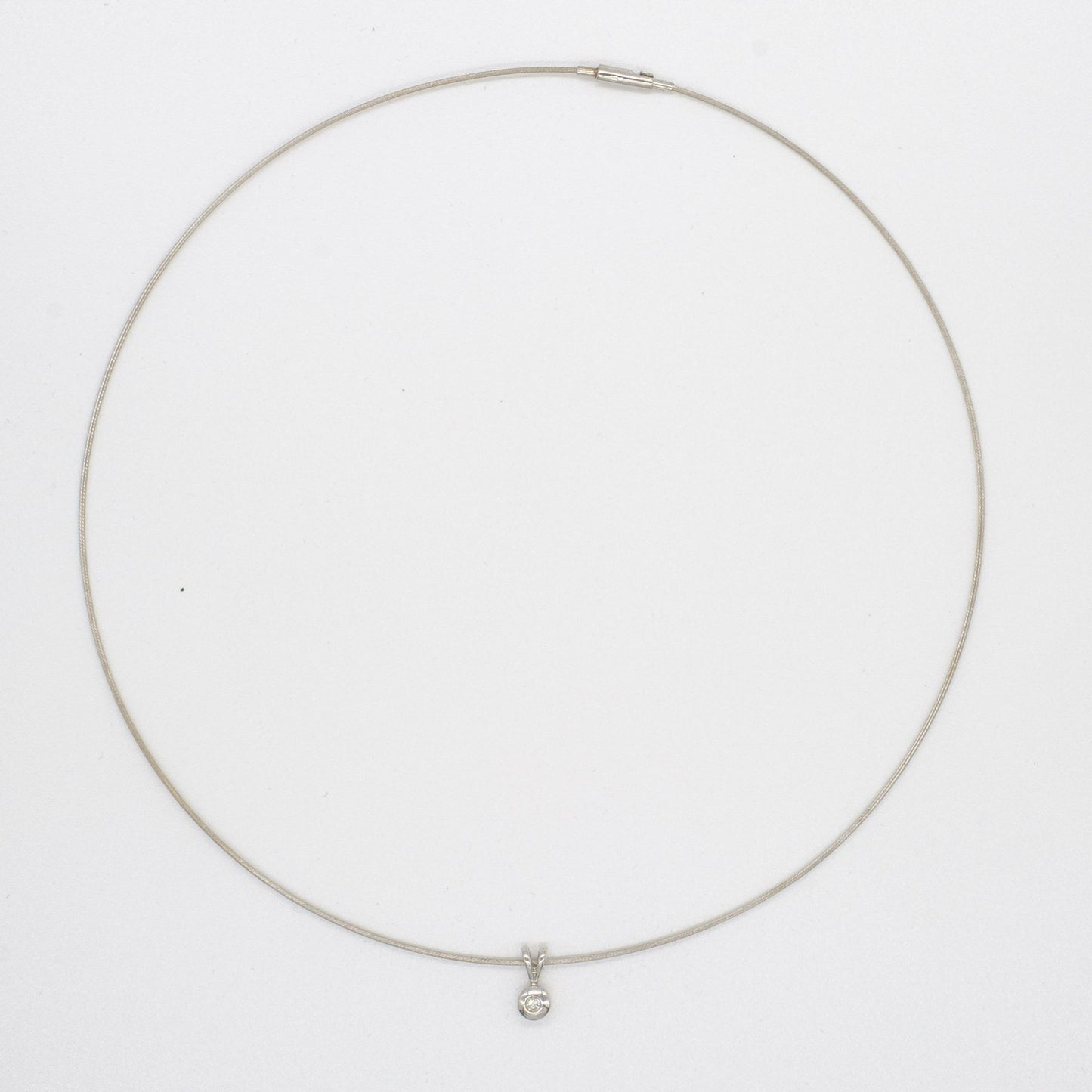 9ct White Gold Diamond Pendant on a 9ct White Gold Wire Necklet