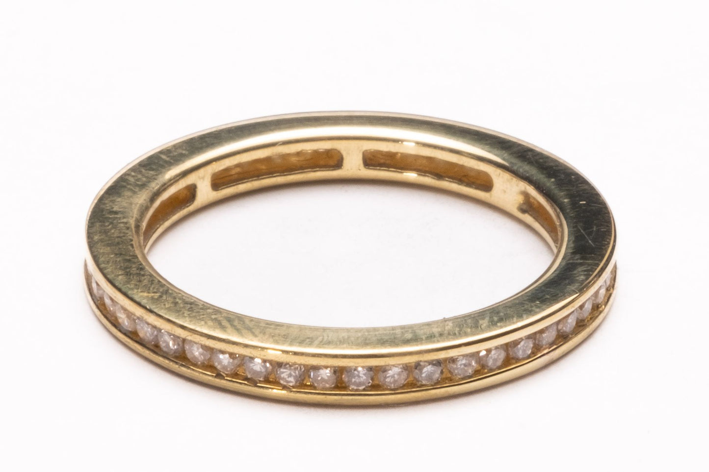 Diamond channel set full eternity 18ct yellow gold ring