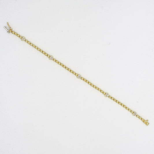 9ct yellow gold bead and white gold diamond set heart design bracelet