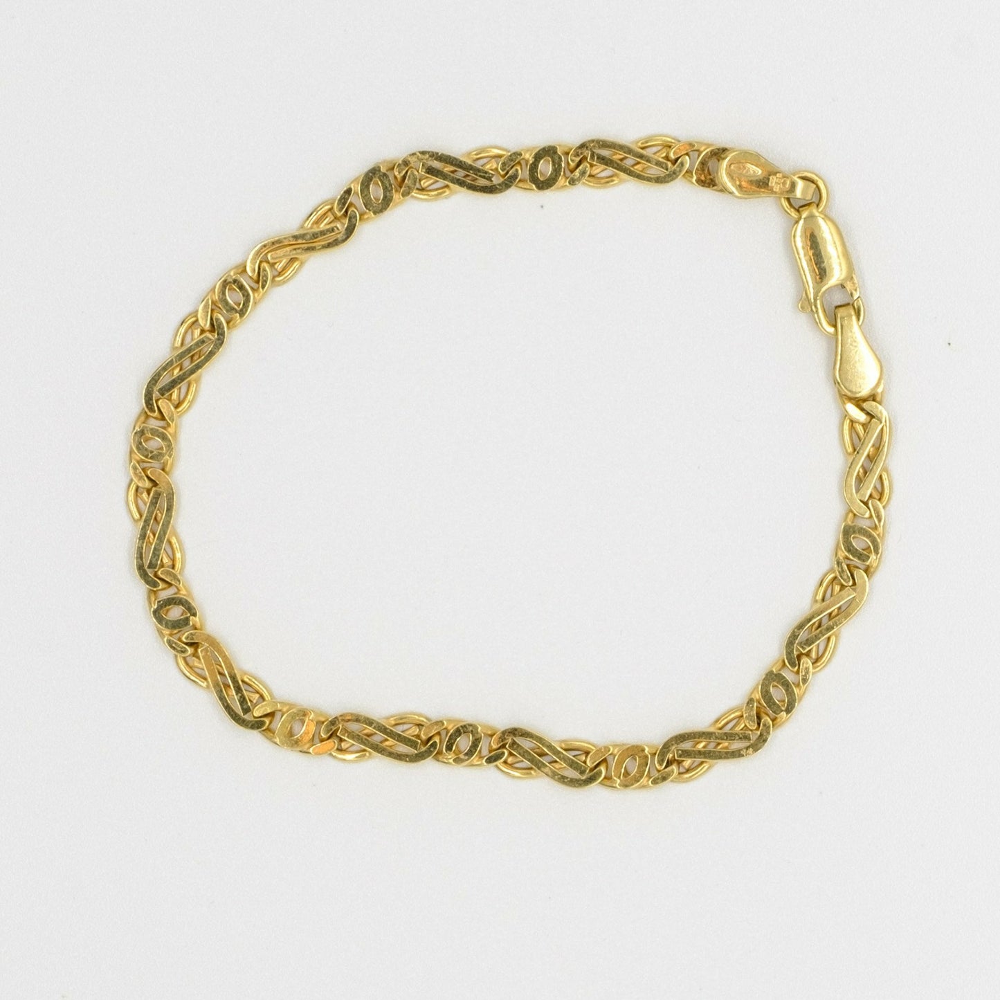 9ct yellow gold fancy filed curb design bracelet