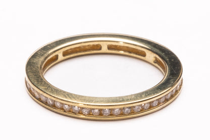 Diamond channel set full eternity 18ct yellow gold ring