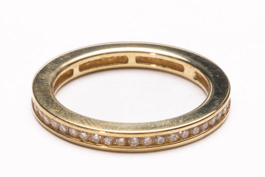 Diamond channel set full eternity 18ct yellow gold ring