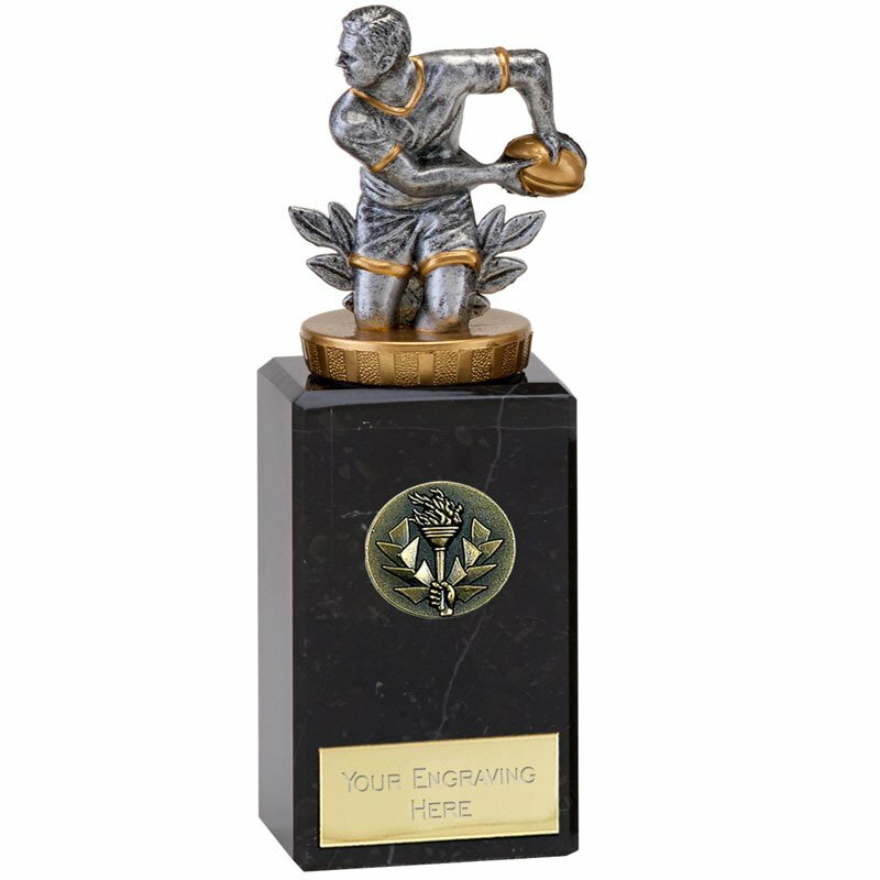 Rugby player and ball on a marble base